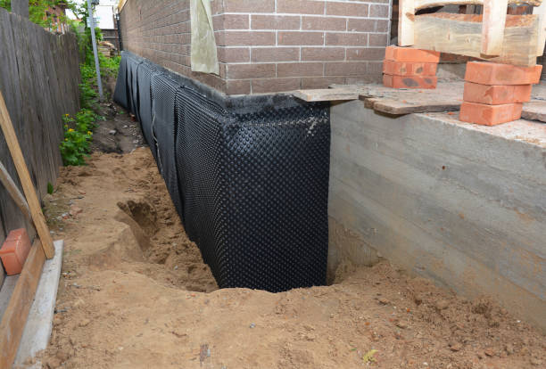 Happy homeowners after waterproofing job in Clarkston